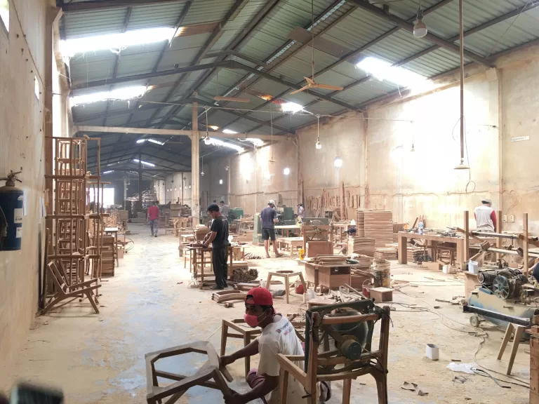 Workshop floor with benches and components in progress
