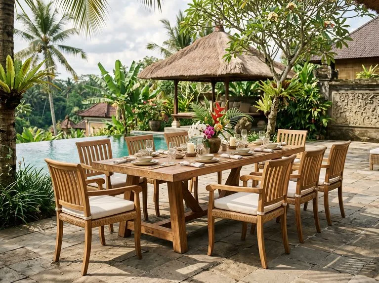 Best wood for outdoor chairs — teak dining chair on hotel terrace